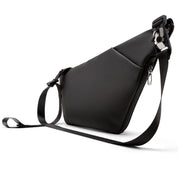 Side angle studio shot of Black FINO IV Chest Bag, showcasing full adjustable woven shoulder strap, quick-release plastic buckle and metal zipper pull tab, smooth waterproof synthetic exterior, clean 1:1 square white e-commerce detail image for product media gallery