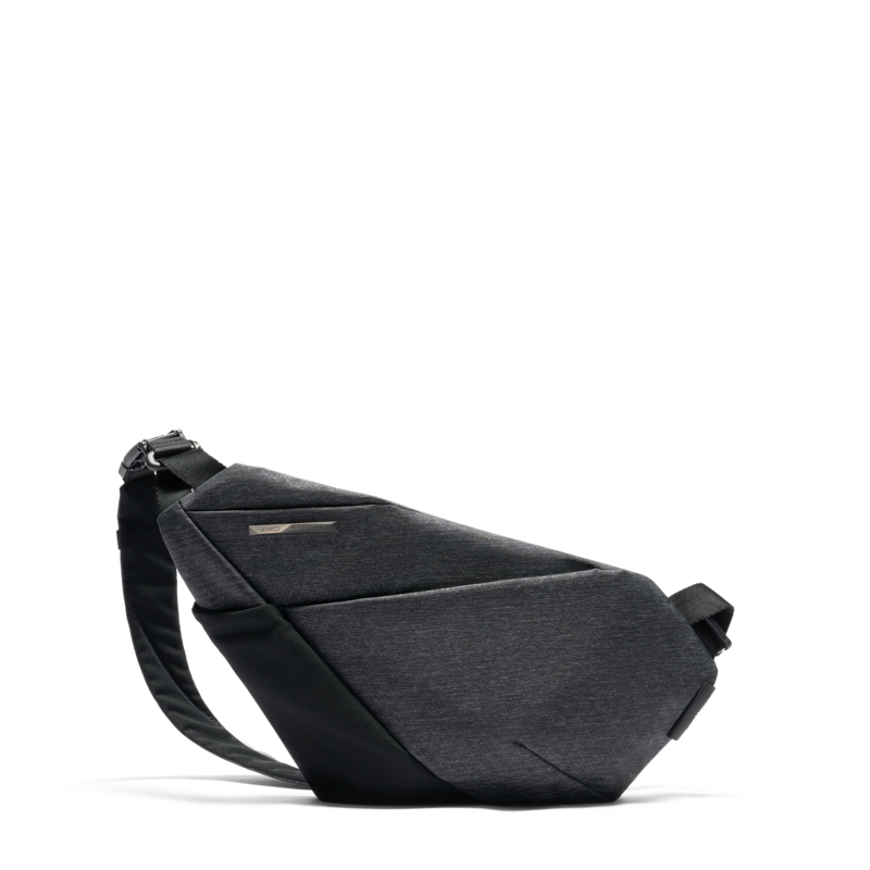 Isolated cutout PNG of Gray Shadow Grid FINO V Ultra-slim Tech Sling crossbody bag, right-handed geometric textured nylon anti-theft chest fanny pack with transparent checkerboard background, minimalist slim waterproof tech sling for men daily commute storage