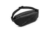Angled front shot of Indigo NIID RO Radiant Chest Bag, herringbone textured waterproof nylon crossbody chest pack, multi-layer zipper compartments, quick-release buckle shoulder strap and engraved metal brand tag