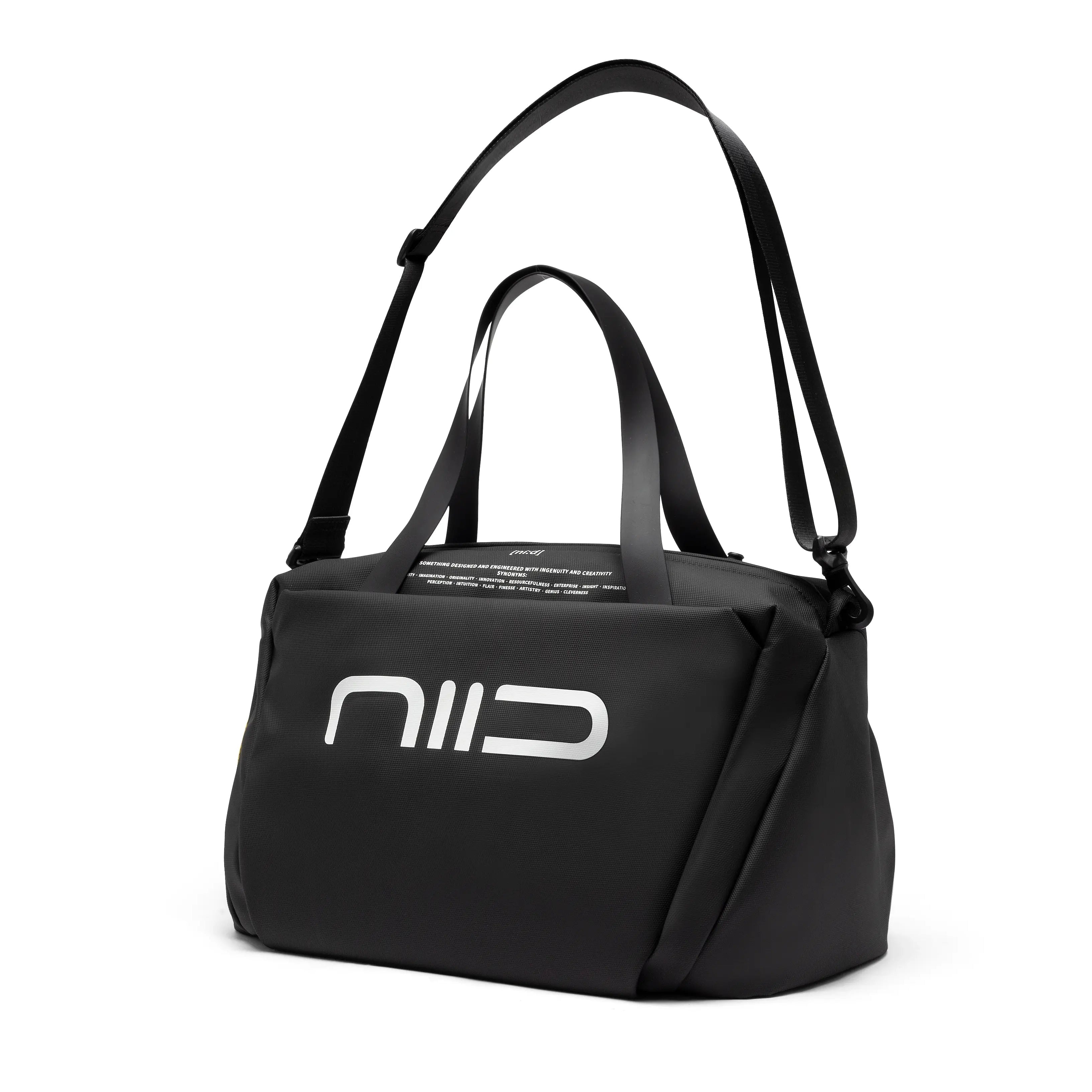 Three-quarter view black NIID S6 Hybrid Sling duffle crossbody bag, equipped with short hand handles and full adjustable long shoulder strap, large silver NIID logo on front, plain white studio background