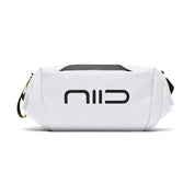 Side close-up view of white NIID S6 Hybrid Sling crossbody bag with bold black front logo, black top handle and yellow zipper tag, compact minimalist sling bag on clean white background