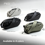 1:1 square studio banner for NIID N1 Nomad crossbody sling bag, showcasing all 4 available color variants on soft light gray gradient background: Pearly Gray, Graphite Gray, Diamond Grid Black, Dewy Moss. Minimal top header text "NIID NOMAD SLING BAG", bottom copy "Available in 4 colors", clean product photography without extra watermarks or brand logos in corner, textured waterproof fabric detail visible on each bag model.