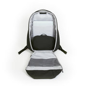 NIID NEO Nomad 30-32L Backpack N4 in Roman Black open showing padded laptop sleeve and black organizer pouch in main compartment.