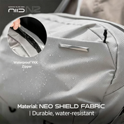 NIID N2 sling bag waterproof fabric and YKK zipper detail shot, pearly gray, water drop demonstration