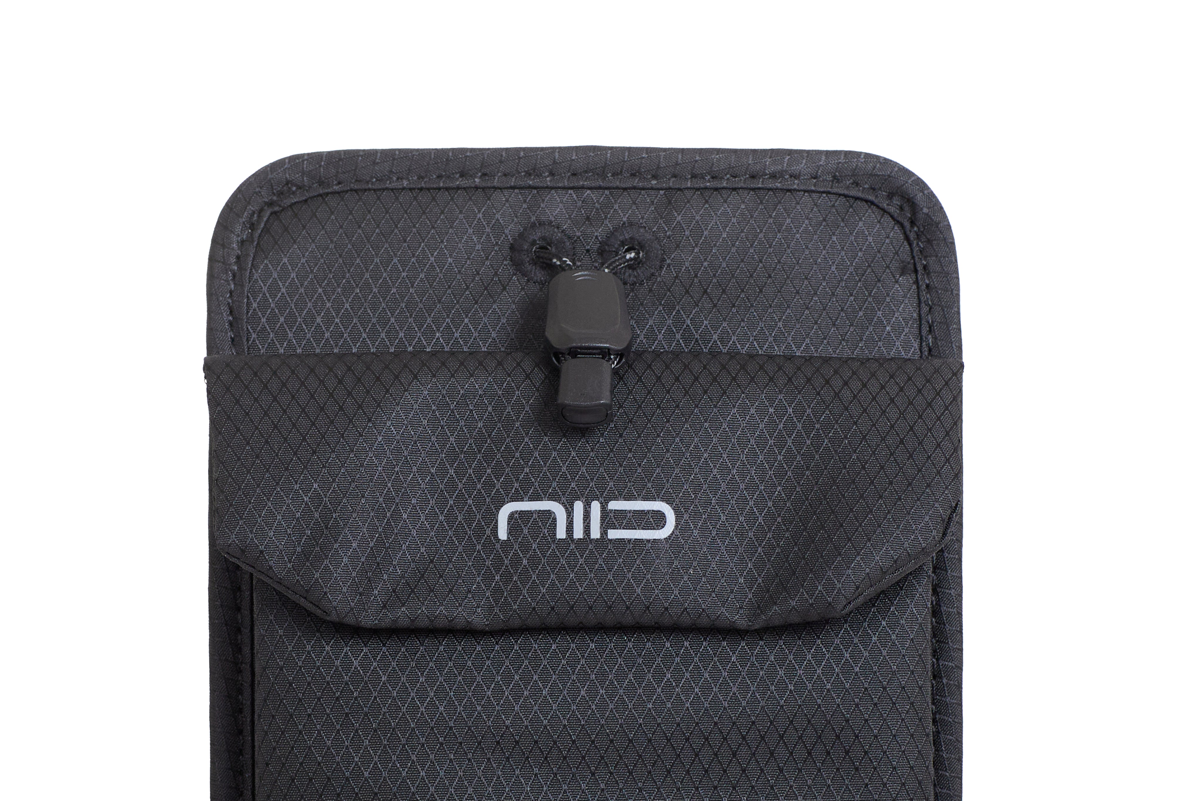Close-up of Diamond Grid Black Nomad Pouch front flap showing NIID logo, black drawstring cord lock and fabric eyelets.
