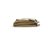 NIID NEO Nomad Pouch in Dune Tan Ripstop, side profile flat lay showing compact folded shape and drawstring cords, white background.