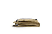 NIID NEO Nomad Pouch in Dune Tan Ripstop, side view showing bottom strap loop and drawstring closure detail.