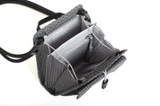 NIID NEO Nomad Pouch in Graphene Gray Ripstop open showing NIID branded lining, zippered mesh pocket and card slots.