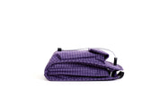 NIID NEO Nomad Pouch in Nebula Purple Ripstop, side profile flat lay showing compact folded shape and drawstring cords.