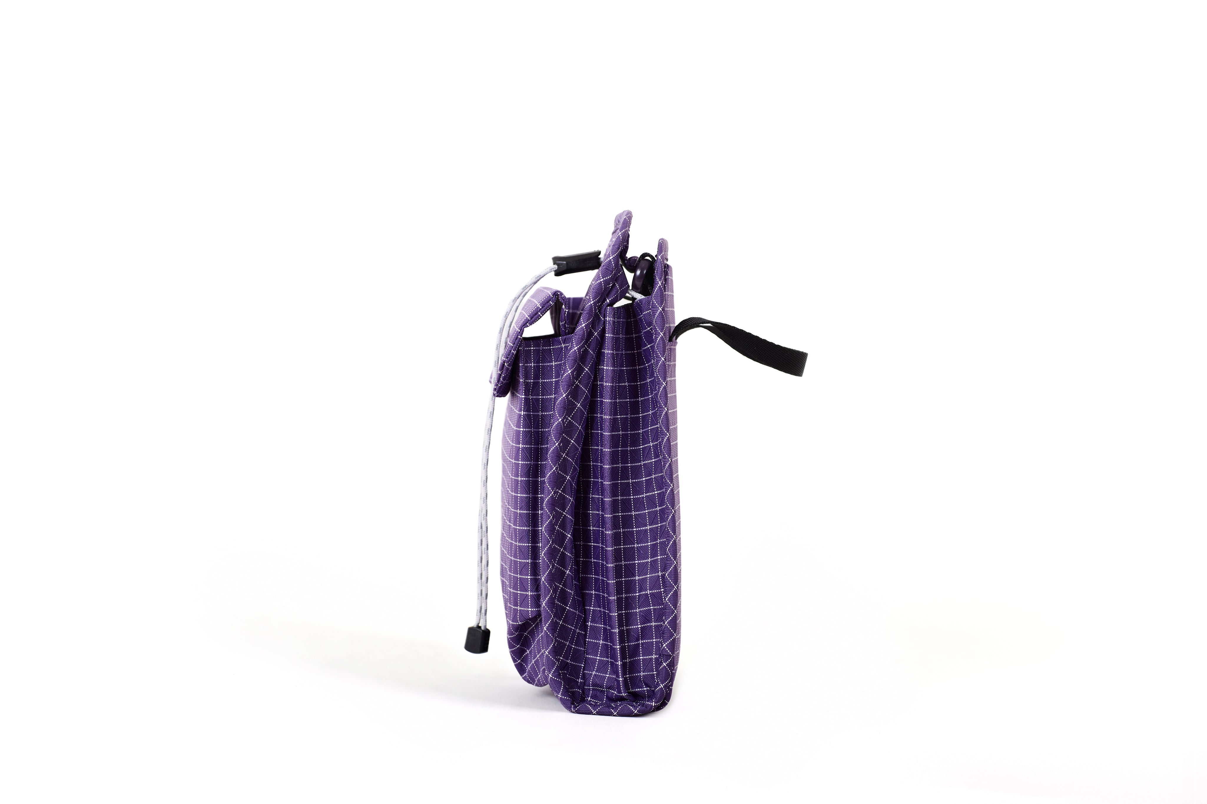 NIID NEO Nomad Pouch in Nebula Purple Ripstop, side standing view showing drawstring cords and bottom carry strap, white background.