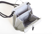 NIID NEO Nomad Pouch in Pearly White open showing NIID branded lining, zippered mesh pocket and card slots.
