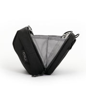 NIID NEO Tech Pouch in black side angle showing interior mesh divider pockets and elastic loops, NIID logo tag on exterior.