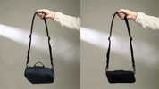 Side-by-side comparison animation of Tech Pouch: Prussian Blue soft shape vs FortiTex Black Cordura structured shape, held by shoulder strap.