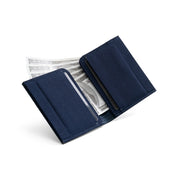 Open dark navy Cordura fabric NIID NEX slim bifold wallet on clean white background, built-in card slots with US dollar bills tucked inside, inner grid lining structure display of wear-resistant minimalist men’s EDC card holder