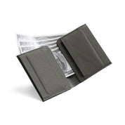 Open dark gray Nebula fabric NIID NEX slim bifold wallet on plain white background, card slots visible with US dollar bills stored inside, interior structure display of minimalist men's EDC card holder