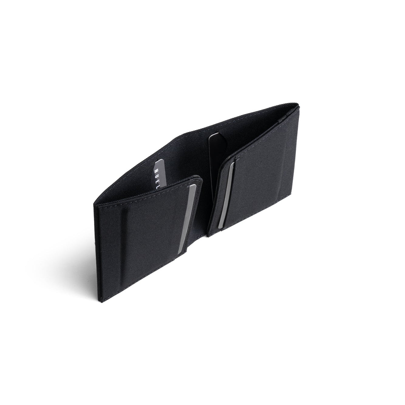 Open solid black Cordura fabric NIID NEX slim bifold wallet standing upright on clean white background, multiple built-in card slots with bank cards inserted, plain durable fabric interior structure display of minimalist men’s EDC card holder