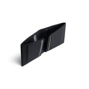 Open solid black Cordura fabric NIID NEX slim bifold wallet standing upright on clean white background, multiple built-in card slots with bank cards inserted, plain durable fabric interior structure display of minimalist men’s EDC card holder