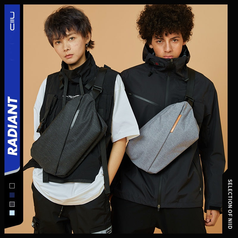 Dual model studio shot showcasing NIID RO Plus sling bags in meteorite black and light gray, unisex urban crossbody chest packs with leather logo tabs, technical streetwear styling, product color selection layout