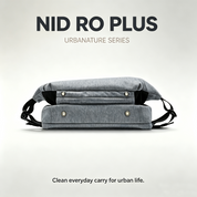 Minimalist cover banner of NIID RO Plus light gray crossbody sling bag with metal snap detail, light gray gradient background, text "NIID RO PLUS URBANATURE SERIES" and slogan "Clean everyday carry for urban life", product introductory hero graphic