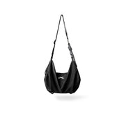 Black NIID VIA Gym Bag slouchy shoulder bag against plain white background