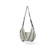Cool gray NIID VIA Gym Bag slouchy shoulder bag against plain white background
