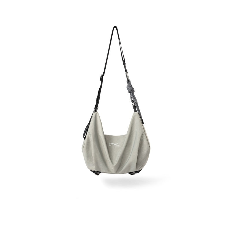 Cool gray NIID VIA Gym Bag slouchy shoulder bag against plain white background