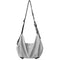 NIID VIA dual-use gym duffle bag cool gray slouch crossbody shoulder bag, knotted woven adjustable strap, embossed NIID logo on front, plain white background product photography