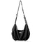 NIID VIA dual purpose duffle gym bag graphite black slouch crossbody shoulder bag, subtle metal NIID logo on front, adjustable woven strap, white background main product photo