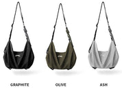 NIID VIA dual-purpose gym duffle bag color comparison graphic showing Graphite black, Olive green, Ash cool gray slouch crossbody shoulder bags with labeled color names, clean white background listing all variants