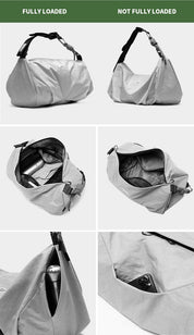 NIID VIA cool gray gym duffle bag capacity demonstration infographic, fully loaded vs empty exterior comparison, multi-compartment interior storage, side pocket holding water bottle and smartphone, white background feature graphic