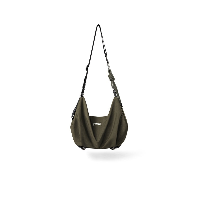 Olive green NIID VIA Gym Bag slouchy shoulder bag against plain white background