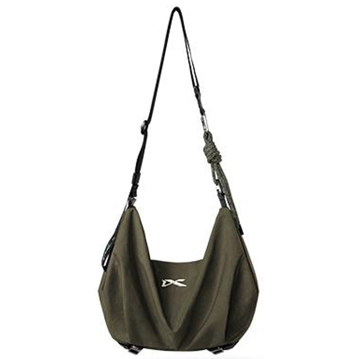 NIID VIA dual-purpose gym duffle bag olive green slouch crossbody shoulder bag, woven knotted adjustable strap, white NIID logo on front, white background studio product photo