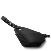 NIID FINO V ultra-slim tech sling Black Noir side profile view, geometric folded structured crossbody chest bag, adjustable comfort shoulder strap, water-resistant lightweight fabric for minimalist urban daily carry