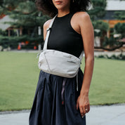 NIID N1 EDC sling bag in Pearly Gray, a versatile unisex crossbody bag with a minimalist techwear aesthetic, ideal for daily urban commuting and professional casual styling