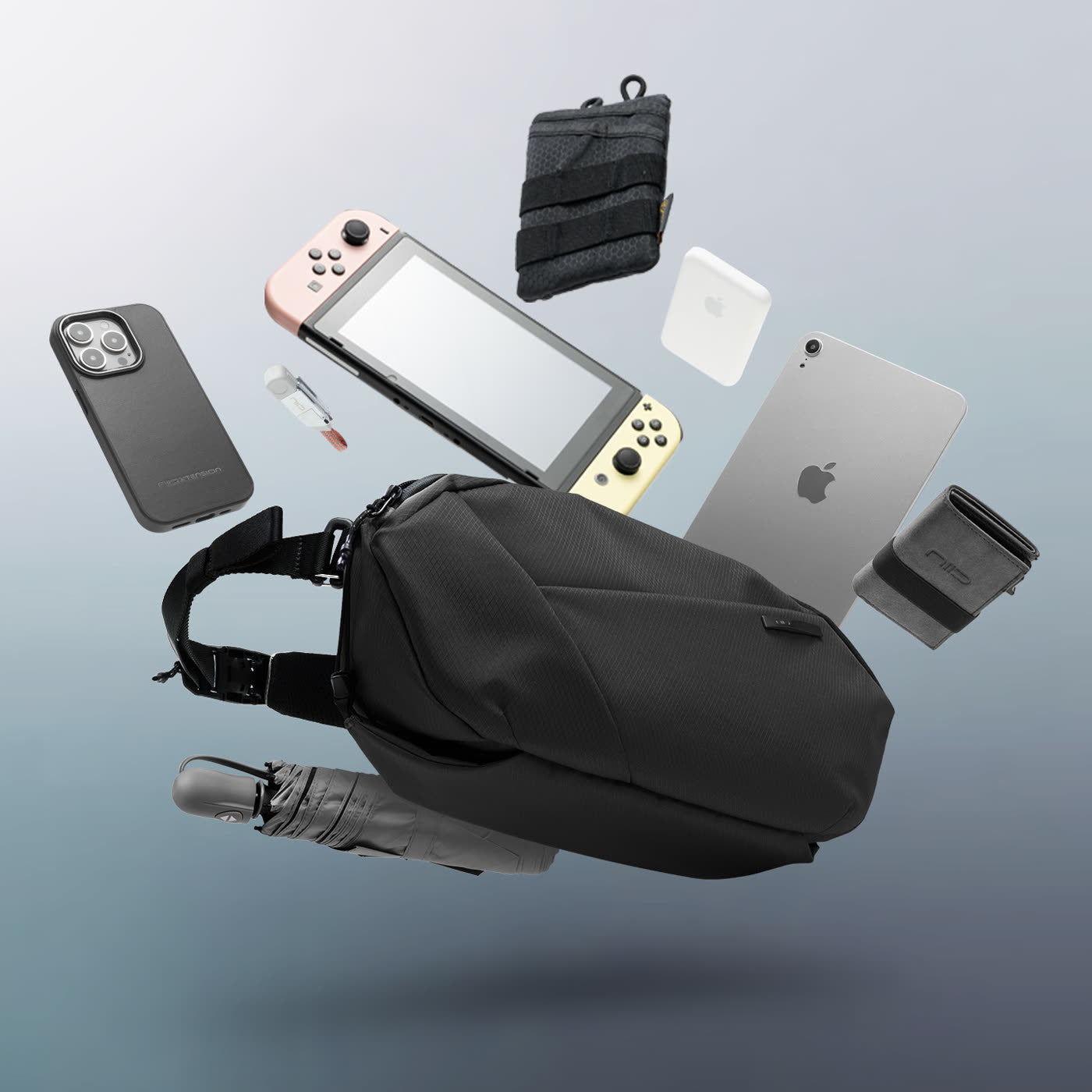 NIID N1L modular sling bag in DIAMOND GRID BLACK carrying a Nintendo Switch, showcasing the perfect portable storage solution for gamers, tech enthusiasts, and urban travelers on the go