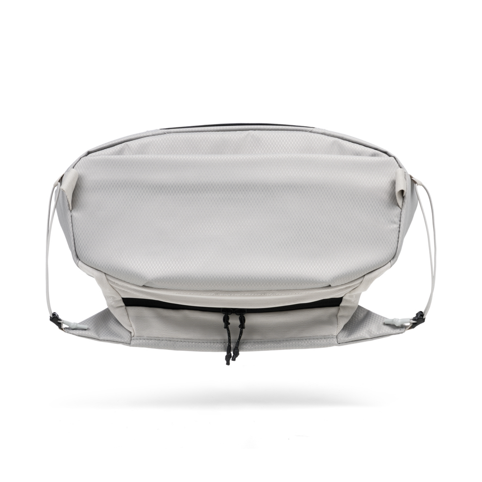 NIID N1L sling bag rear outer view, crafted from wear-resistant diamond pattern nylon material with fine stitching.