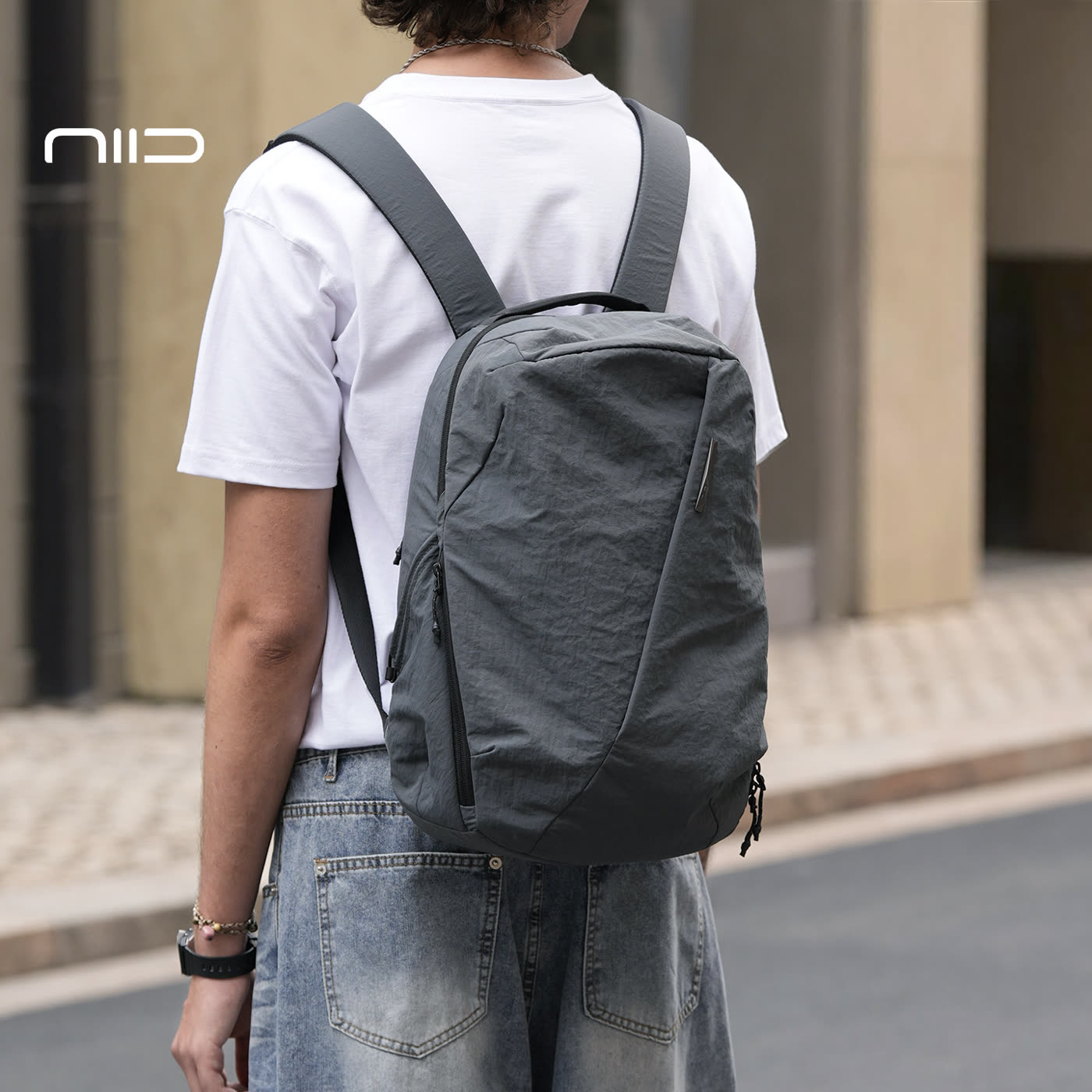 NIID N3 NEO Nomad 19L modular backpack in Mineral Grey, a versatile urban commuter bag featuring a sleek, water-resistant design and ample space for daily essentials and tech gear.