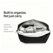 NIID NEO Nomad 9L Sling Bag N2 fully open interior infographic with labeled compartments, layered padded tech pockets, cable slots and hidden zipper pouch for smartphone, earbuds and power bank, lightweight crossbody tech organizer bag for commute and travel gear storage