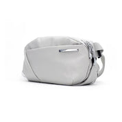 NIID NEO Nomad N1 pearly gray crossbody bag isolated on a white background, perfect for urban commuting and digital nomad everyday carry.