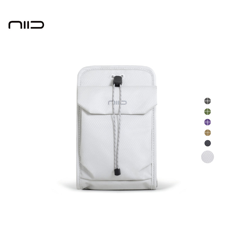 NIID NEO Nomad Pouch in Pearly Gray, a minimalist EDC organizer bag for urban commuters and travel.