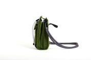 NIID NEO Nomad Pouch Pine Green Ripstop mini drawstring pouch, grid water-resistant fabric with adjustable drawstring opening, thick rope shoulder strap for daily crossbody wear, minimalist side profile shot on clean white background.
