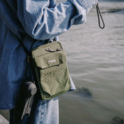 NIID NEO Nomad Pouch Pine Green Ripstop Crossbody Bag Worn Outdoors