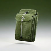 NIID NEO Nomad Pouch in Pine Green Ripstop, showing interior capacity for a passport, pens, and daily EDC essentials.