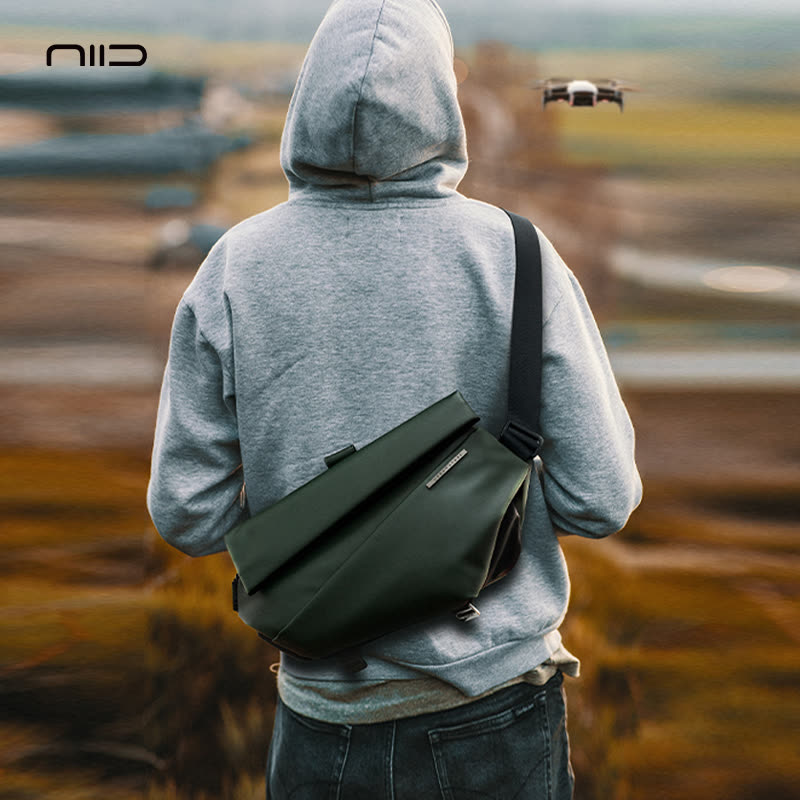 NIID R1 Radiant Black Label premium modular sling bag, an exclusive edition featuring refined materials and sleek minimalist design, perfect for professional urban commuting and high-end everyday carry.