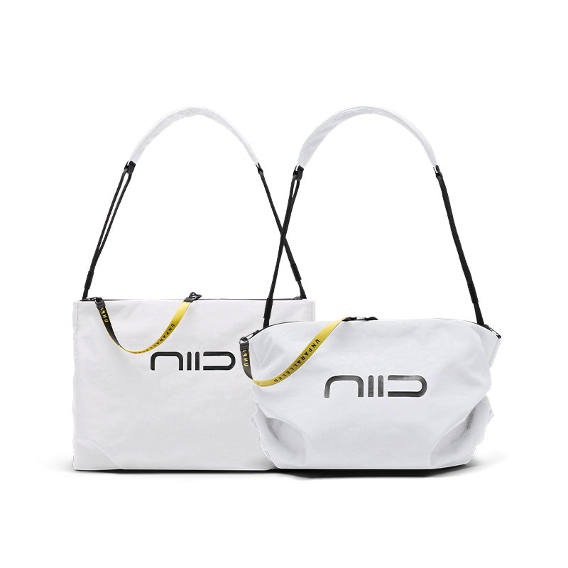 White two size version front display, large and small capacity contrast with branded logo and yellow accent strap