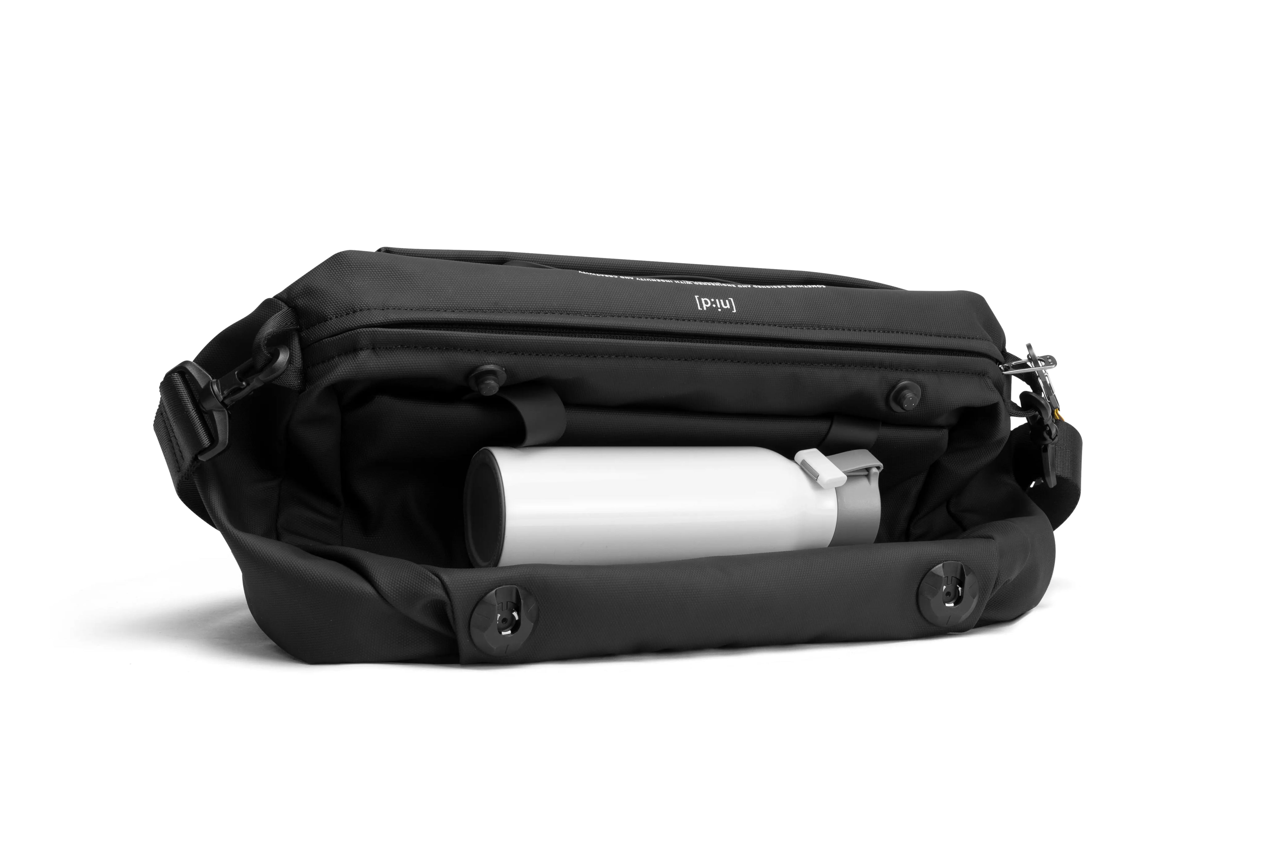 NIID S6 Hybrid Sling Statement Black side view, showing side pocket storage with water bottle inside, plain white studio background